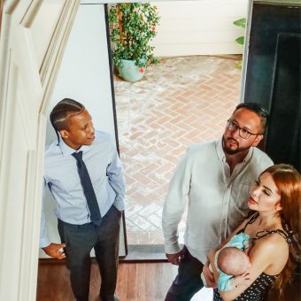 A couple looking the home interior for buying the house