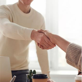 Warm handshake after a deal